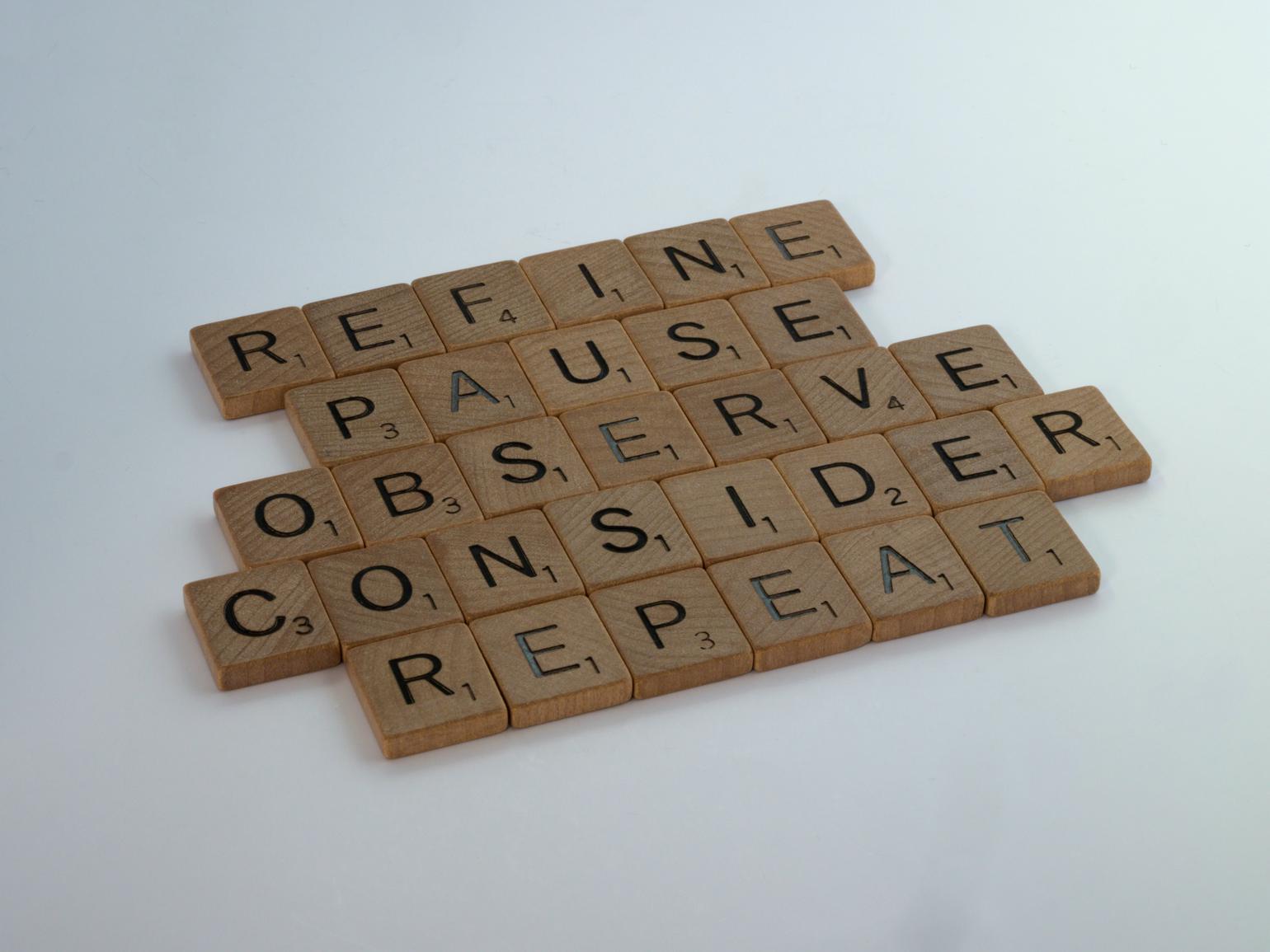 Scrabble tiles reading "Refine, Pause, Observe, Consider, Repeat"