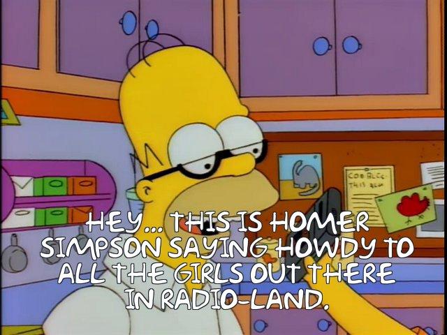 Homer Simpson speaking into a tape recorder